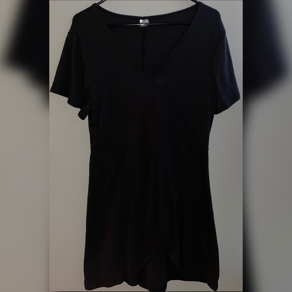 Black slit romper.